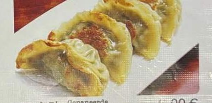 Gepaneerde varkensravioli